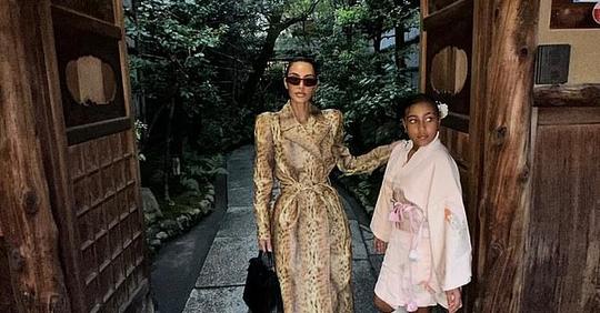 Kim Kardashian dons leopard print coat in latest snaps from her trip to Japan with daughter North West